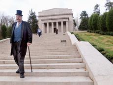 Description: <div class="source">Neal Cardin</div><div class="image-desc">President William Howard Taft, portrayed by Dale Liikala of Mentor, Ohio, descends the steps of the Abraham Lincoln Memorial Hall on Monday during a centennial celebration of the opening of the building. President Taft was the featured speaker 100 years ago.</div><div class="buy-pic"><a href="http://www.lcni5.com/cgi-bin/c2newbuyphoto.cgi?pub=053&amp;orig=1114memorial1.jpg" target="_new">Buy this photo</a></div>